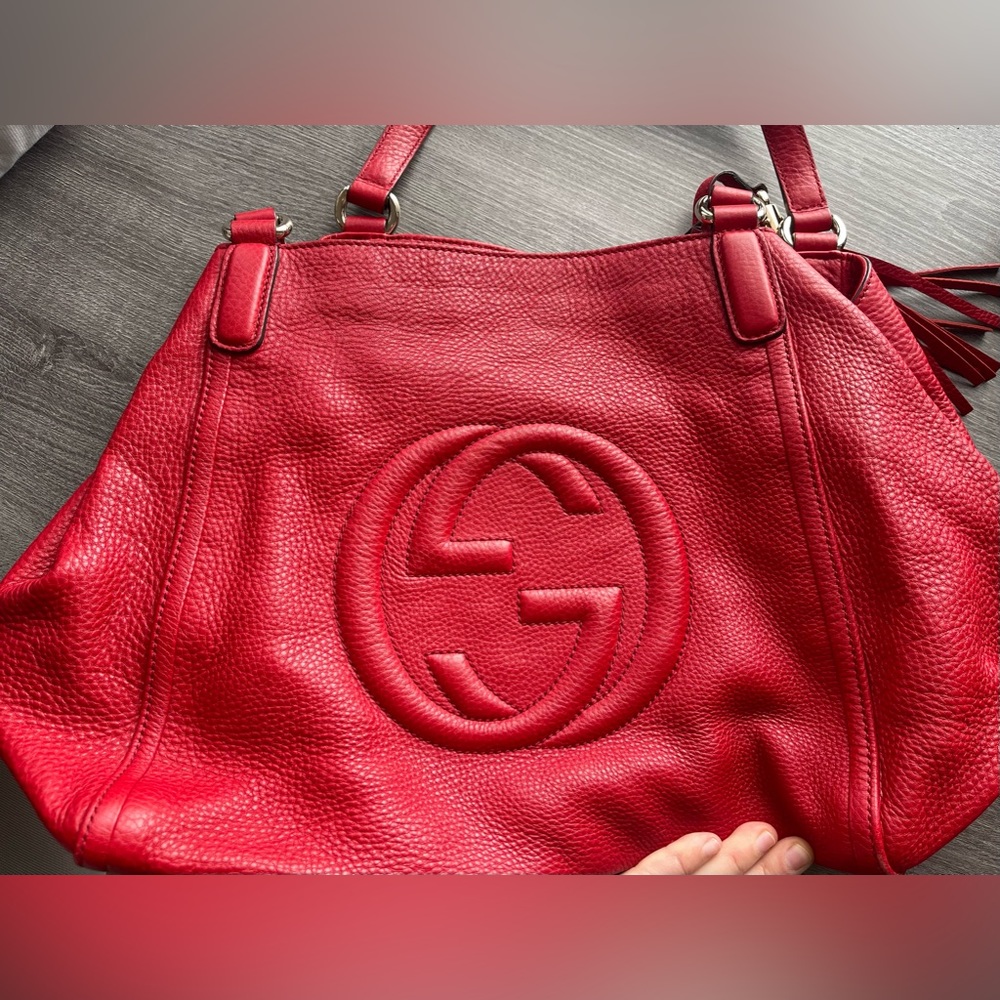 Gucci red bag.